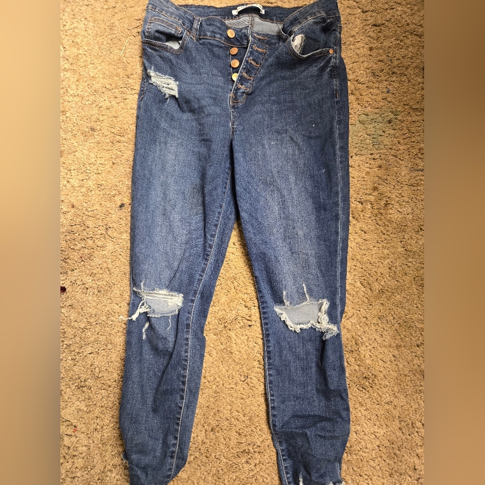Ripped dark wash skinny jeans
